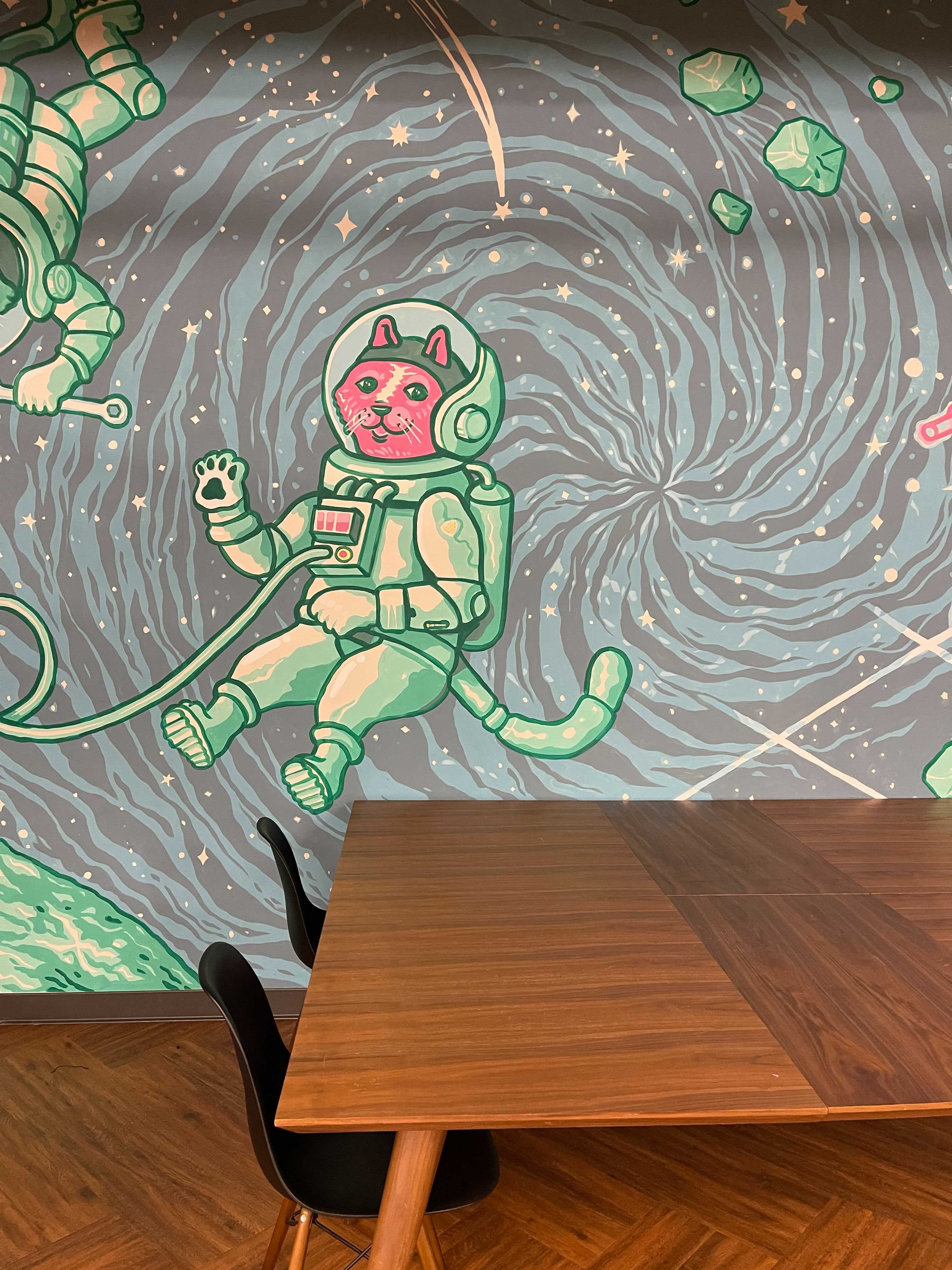 Meow 108 mural above conference table at Robinhood HQ